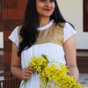 Off-white-pleated-dress-with-golden-brocade