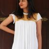 Off-white-pleated-dress-with-golden-brocade